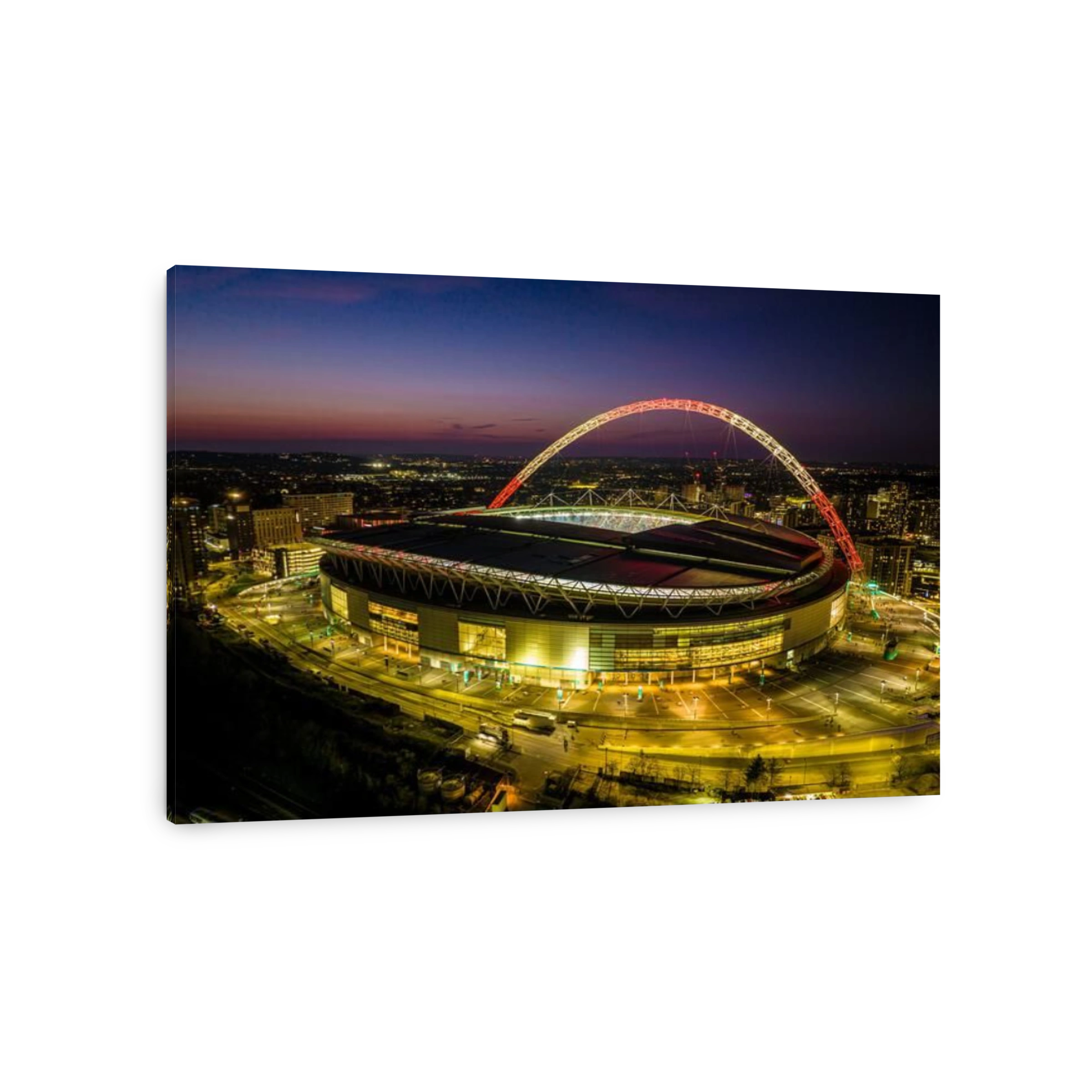 Wembley Stadium with arch lit up in Red and White to support the England football team