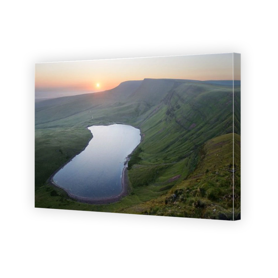 Sunrise, photographed from the peaks of the Black Mountain, on the border of Carmarthenshire and Powys, Wales, UK.