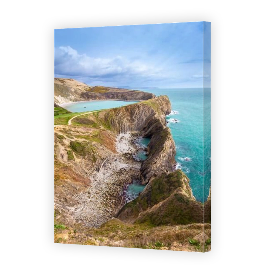 View of Lulworth Cove chalky formations near West Lulworth, on the Isle of Purbeck in Dorset, Jurassic Coast, southern England.