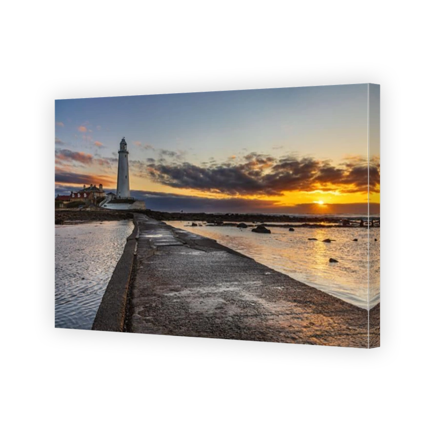 Sunrise at St. Mary's Lighthouse at Whitley Bay, North Tyneside, Uk. The Lighthouse is a grade II listed building