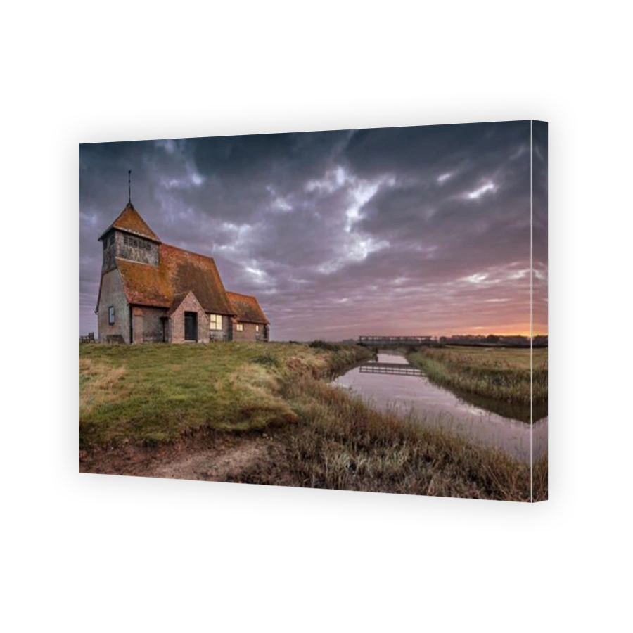 St Thomas a Becket Church, also known as Fairfield Church in Romney Marsh Kent on an Autumn sunrise morning.
