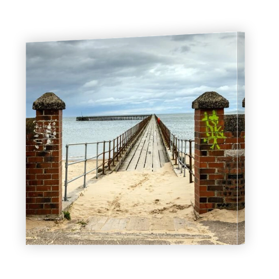 Entrance to the old wooden south pier at the port of Blyth in Northumberland, England.