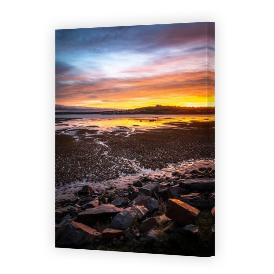 Northam Burrows near Appledore, North Devon, England. After a cold night the sunrise is spectacular over the estuary at Northam Burrows near the coast