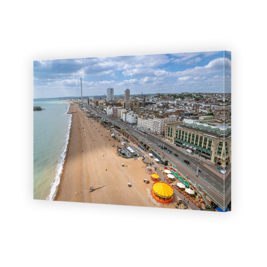 The drone aerial view of the beach and downtown district of Brighton, England.