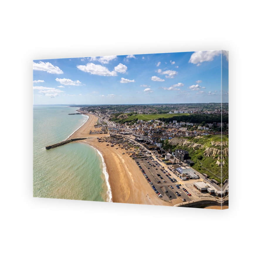 The drone aerial view of Hastings beach and city, England.