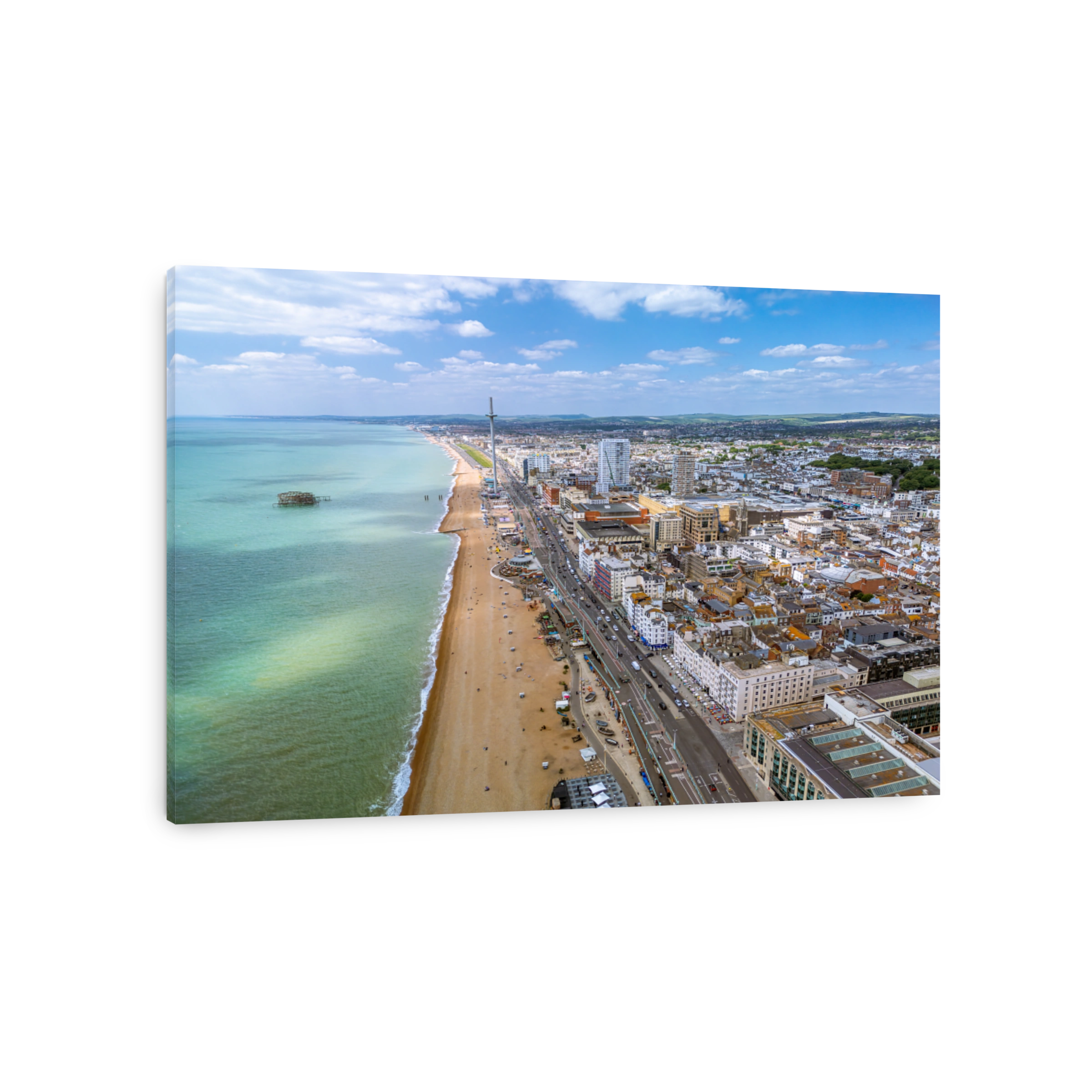 The drone aerial view of the beach and downtown district of Brighton, England.