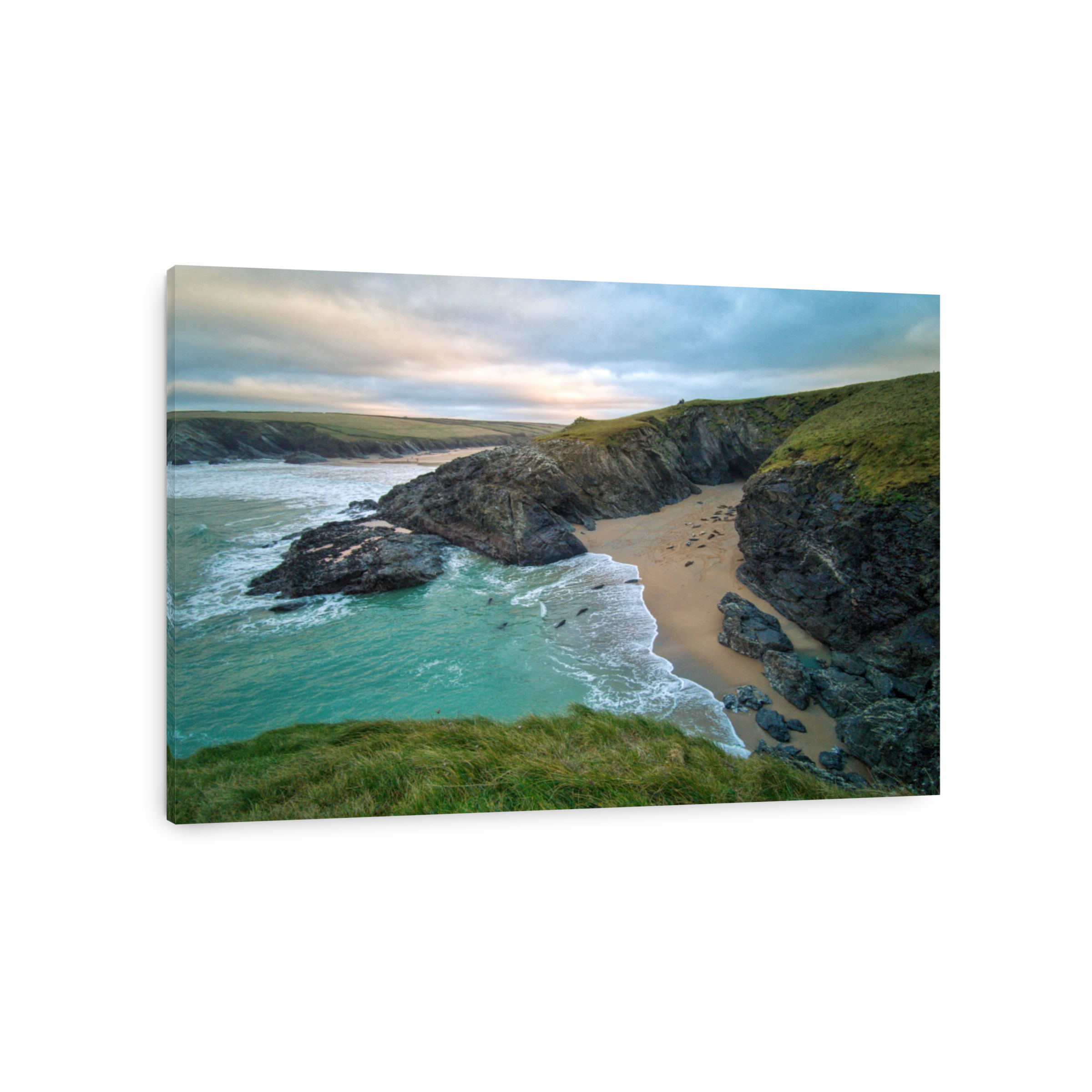 Scenic View Of Rocks On Shore Against Sky