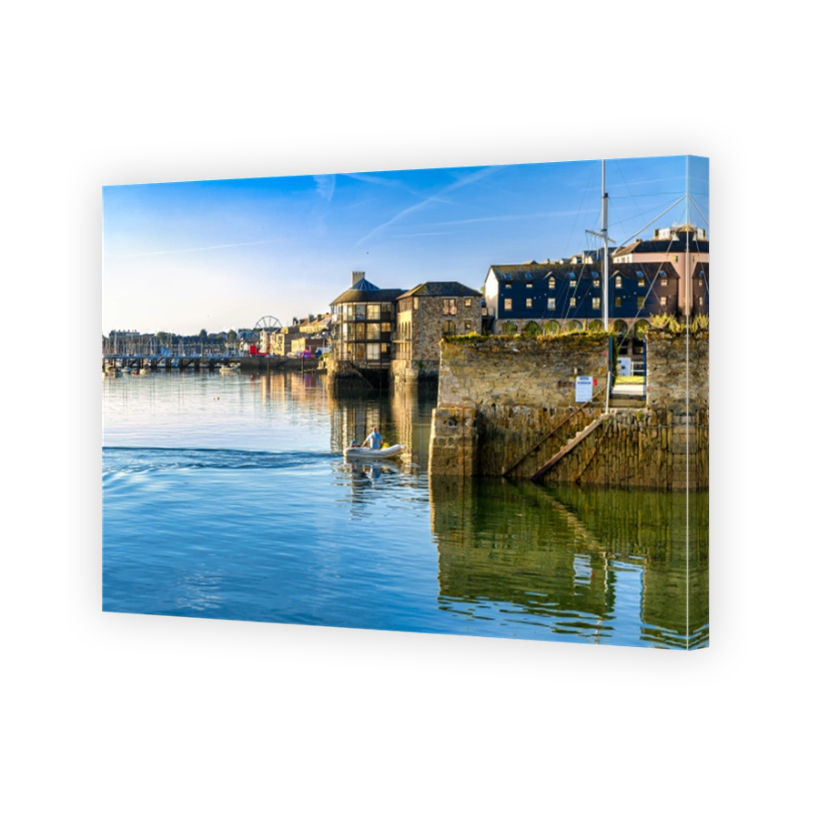 A Man In A Small Boat In Falmouth Harbour, Cornwall, Uk
