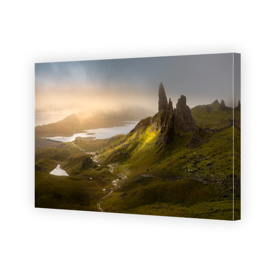 Dark and moody low clouds over the iconic Old Man of Storr on the Isle of Skye, Scotland, UK.