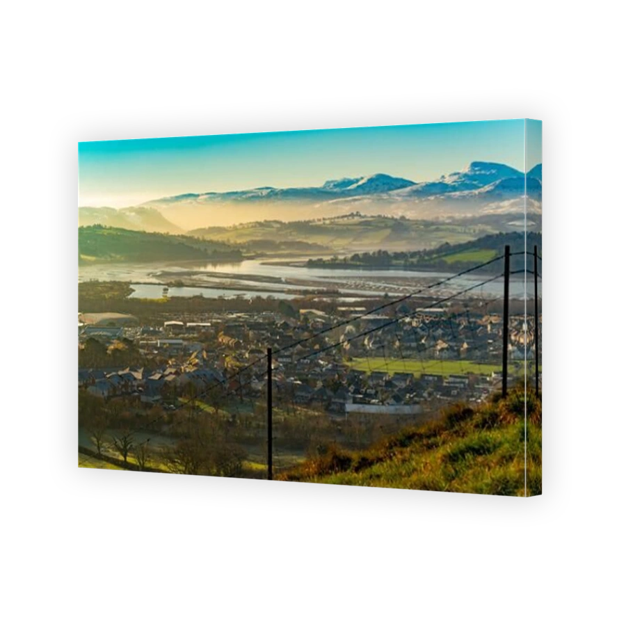 The River Conwy Estuary, Conwy Valley, with the Town of Llandudno Junction in the foreground. In the county of Conwy, North Wales. Taken January 2021.