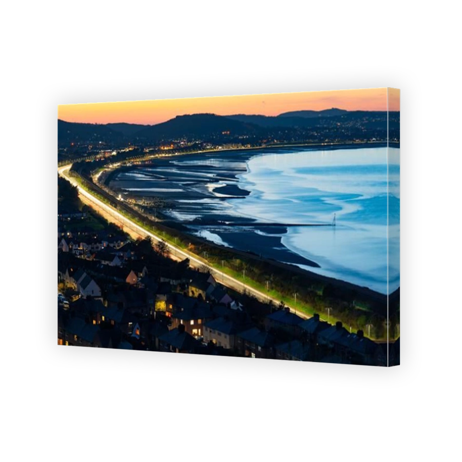 The A55 Expressway passing through Colwyn Bay, viewed from Llanddulas and taken on the 18th of March 2022.