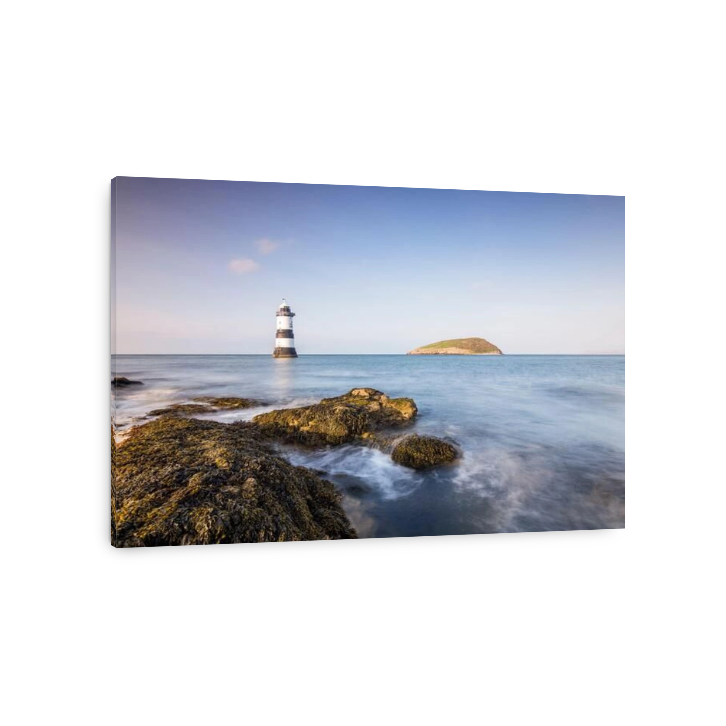 Evening iight at Penmon Lighthouse and Puffin Island, Anglesey, North Wales.