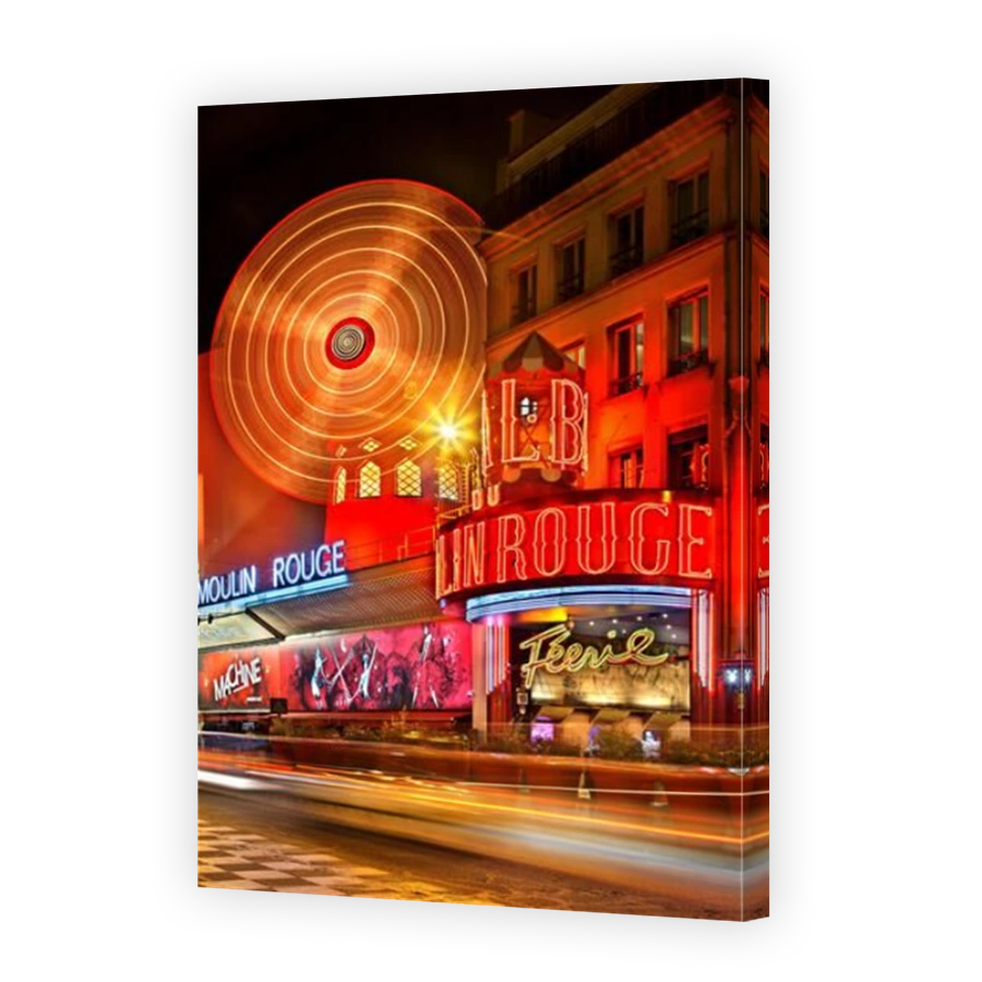 Moulin Rouge ("red mill") one of the world's most famous cabarets, at Pigalle district, close to Montmartre, Paris, France
