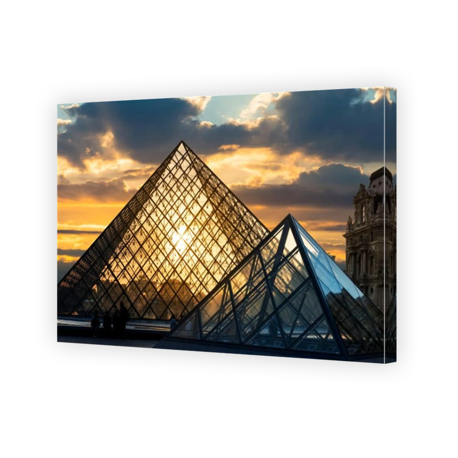 Paris - June 04, 2017 : Louvre museum at dusk on June 04, 2017 in Paris. This is one of the most popular tourist destinations in France displayed over