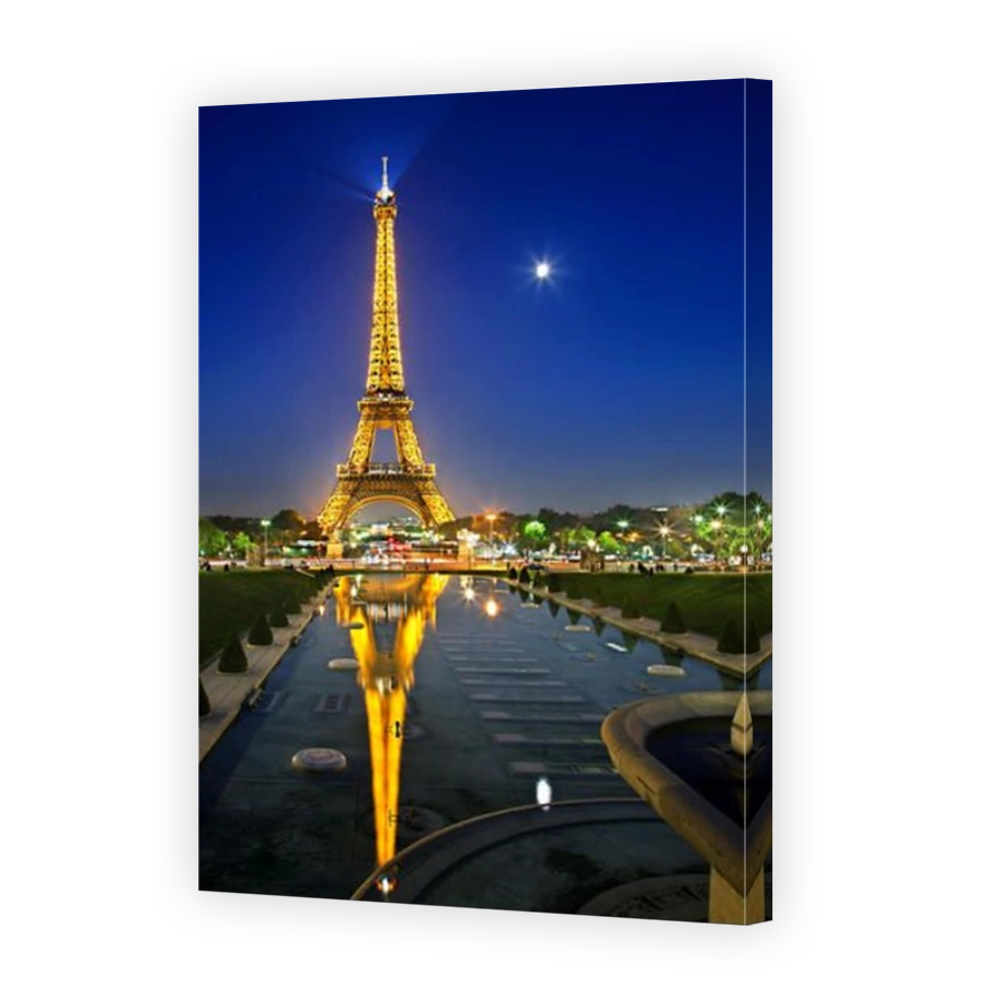 The Eiffel tower reflected in the fountains of the Trocadero gardens, Paris, France. View from Palais de Chaillot.