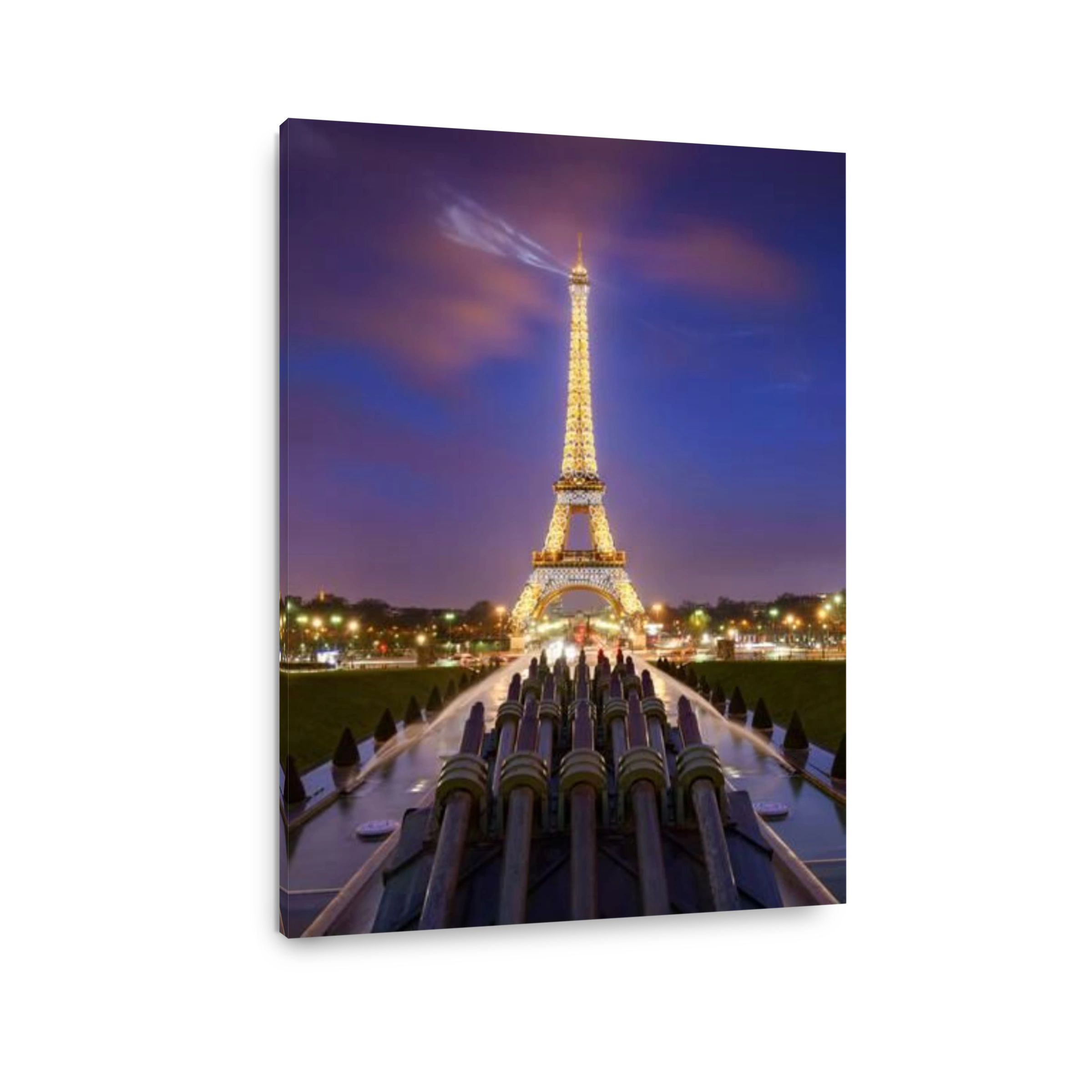 The Eiffel Tower illuminated at night and beacon. Trocadero, Champs-de-Mars, Paris, France