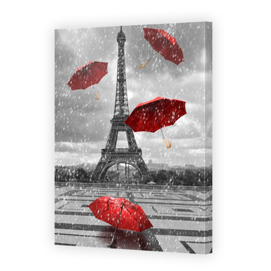 Eiffel tower with flying umbrellas.