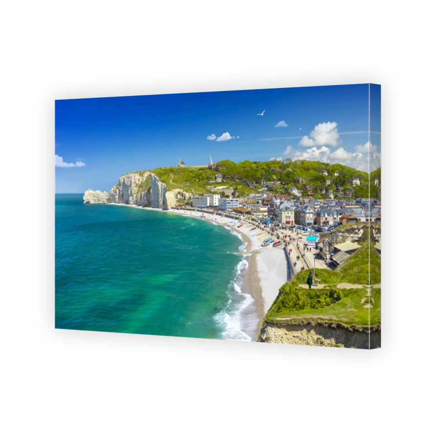 Panoramic view of the beach of Etretat in Normandy, a popular french seaside town known for its chalk cliffs