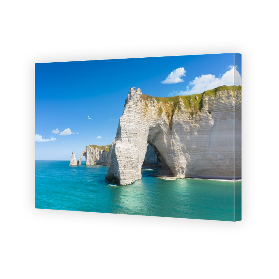 Panoramic view of the beach of Etretat in Normandy, a popular french seaside town known for its chalk cliffs