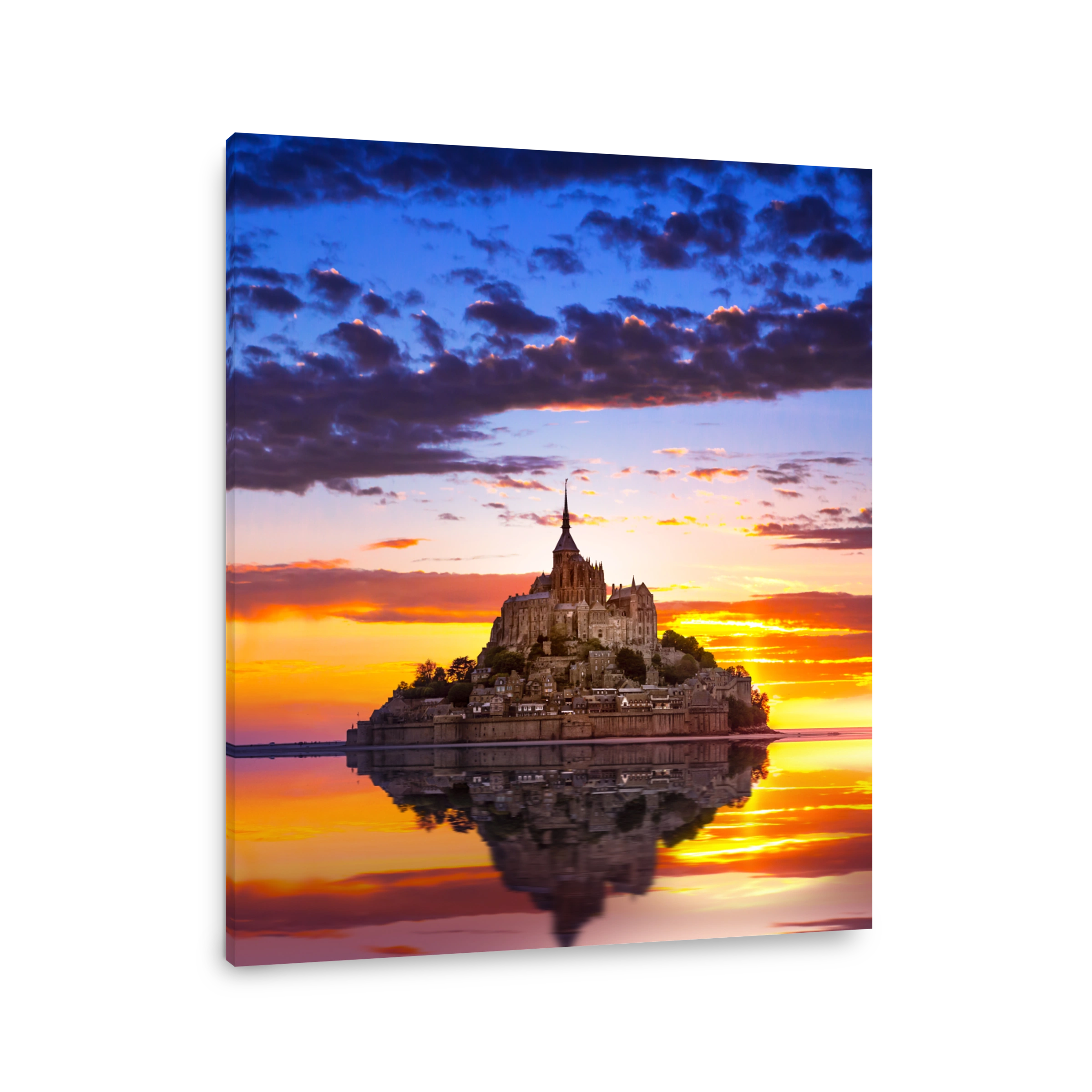 Mont Saint-Michel island with abbey and small town in the sunset light. Normandy, northern France