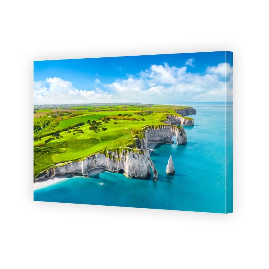 Picturesque panoramic landscape on the cliffs of Etretat. Natural amazing cliffs. Etretat, Normandy, France, La Manche or English Channel. Coast of the Pays de Caux area in sunny summer day. France