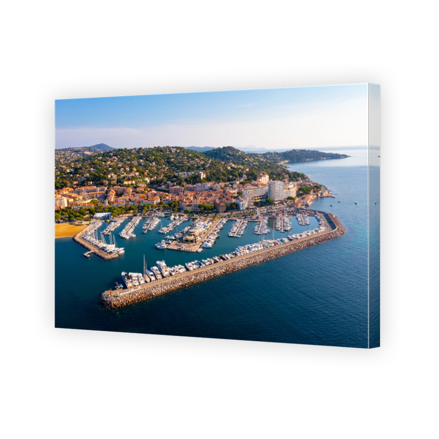 View from drone of Sainte-Maxime townscape on Mediterranean coast with port