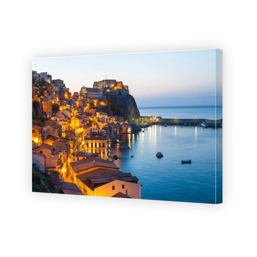 Town View at dusk, with Castello Ruffo, Scilla, Calabria, Italy