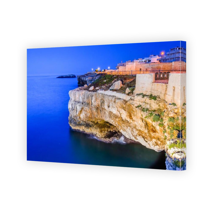 Puglia, Italy. Sunset scenery of Polignano a Mare, town in the province of Bari, Apulia, southern Italia on the Adriatic Sea
