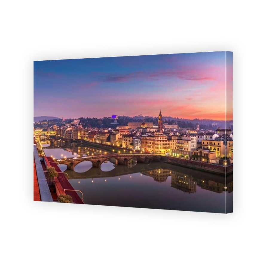 Florence, Italy skyline on the Arno River at dusk.