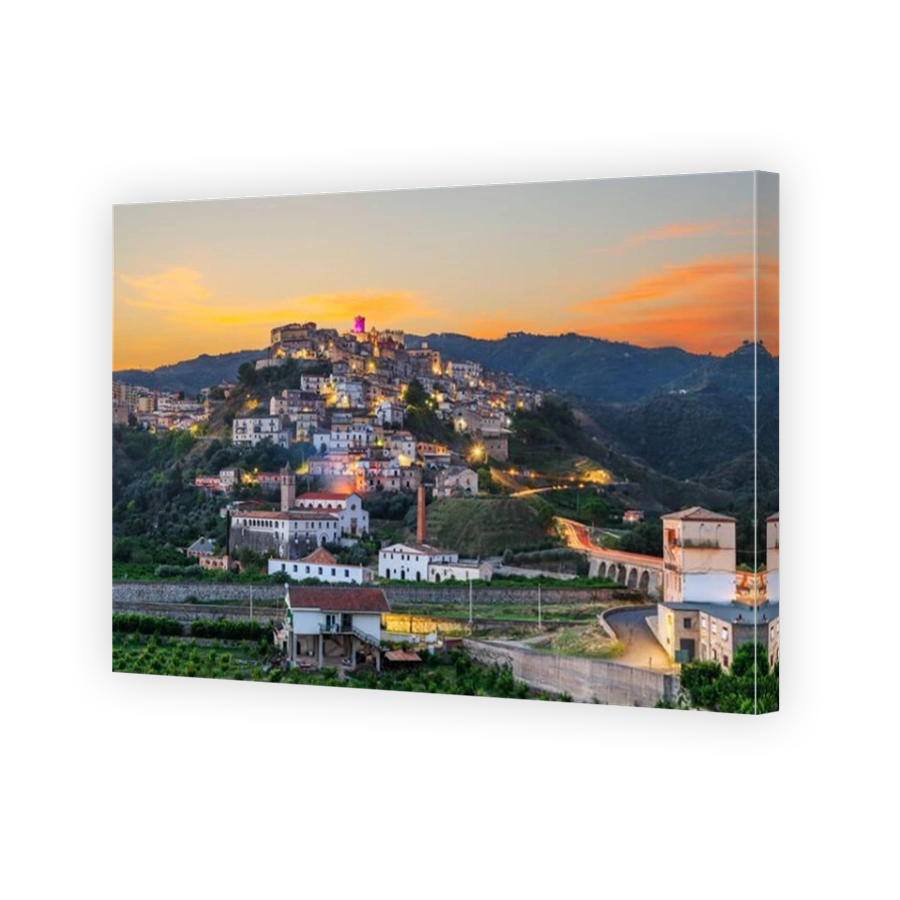 Corigliano Calabro, Italy hilltop townscape at golden hour.