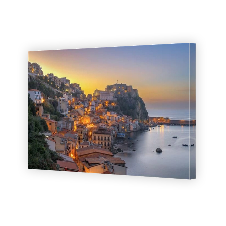 Scilla, Italy on the Mediterranean Sea at dusk.