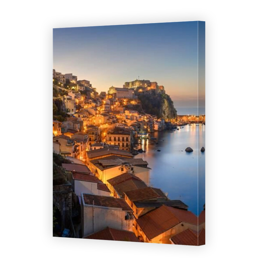 Scilla, Italy on the Mediterranean Sea at dusk.