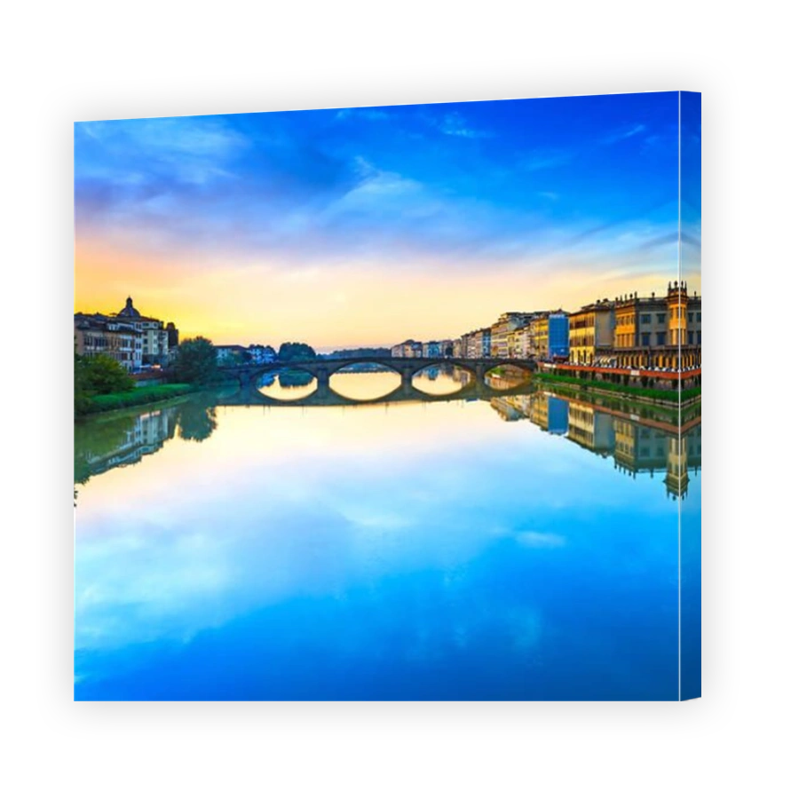 Florence, Ponte alla Carraia medieval Bridge landmark on Arno river, sunset landscape with reflection. It is the second oldest bridge, built in 1218,
