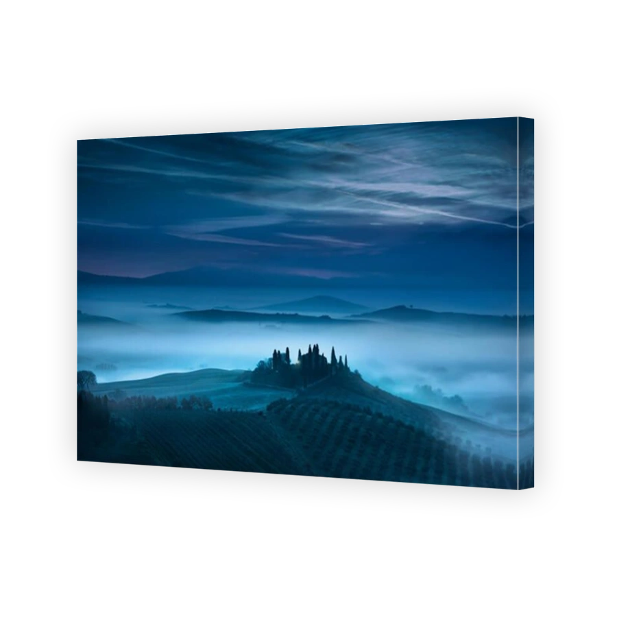 Tuscany blue foggy morning, farmland and cypress trees country landscape. Italy, Europe.