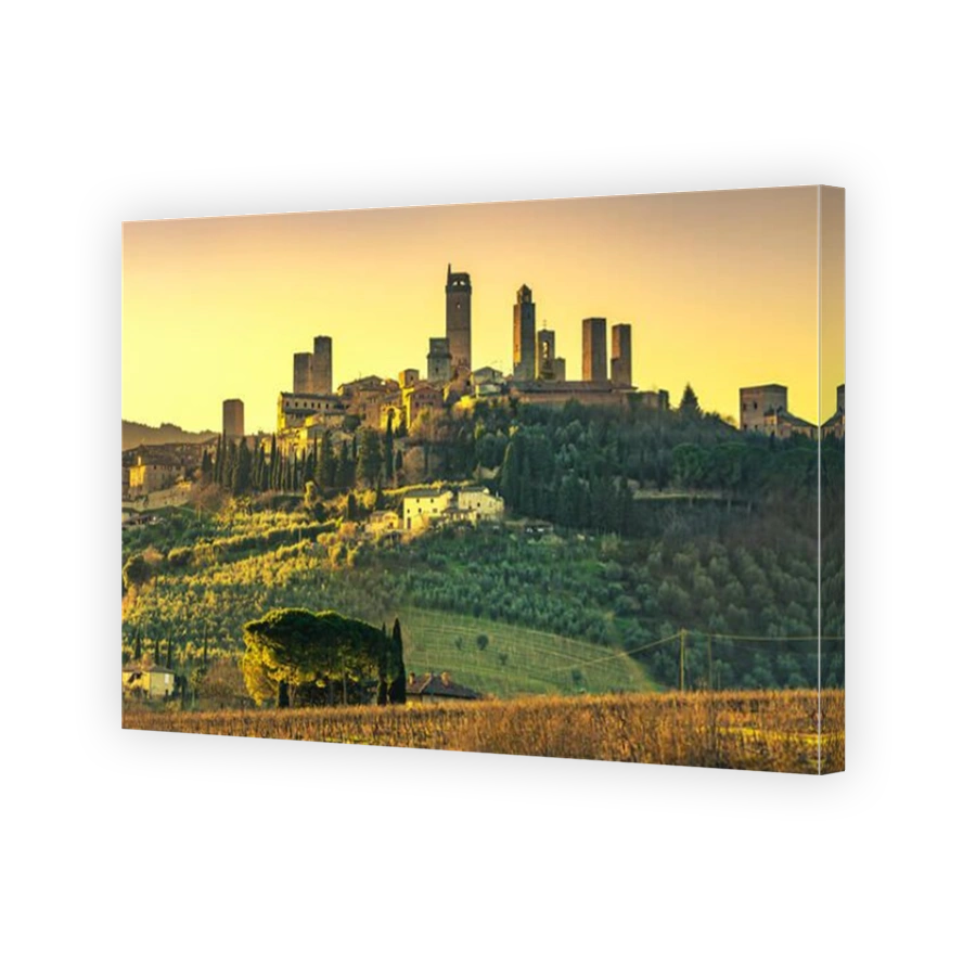 San Gimignano medieval town towers skyline and countryside landscape panorama on sunset. Tuscany, Italy, Europe.