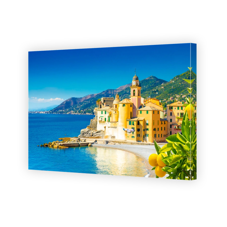 Scenic Mediterranean riviera coast. Panoramic view of Camogli town in Liguria, Italy. Basilica of Santa Maria Assunta and colorful palaces. Liguria, Italy