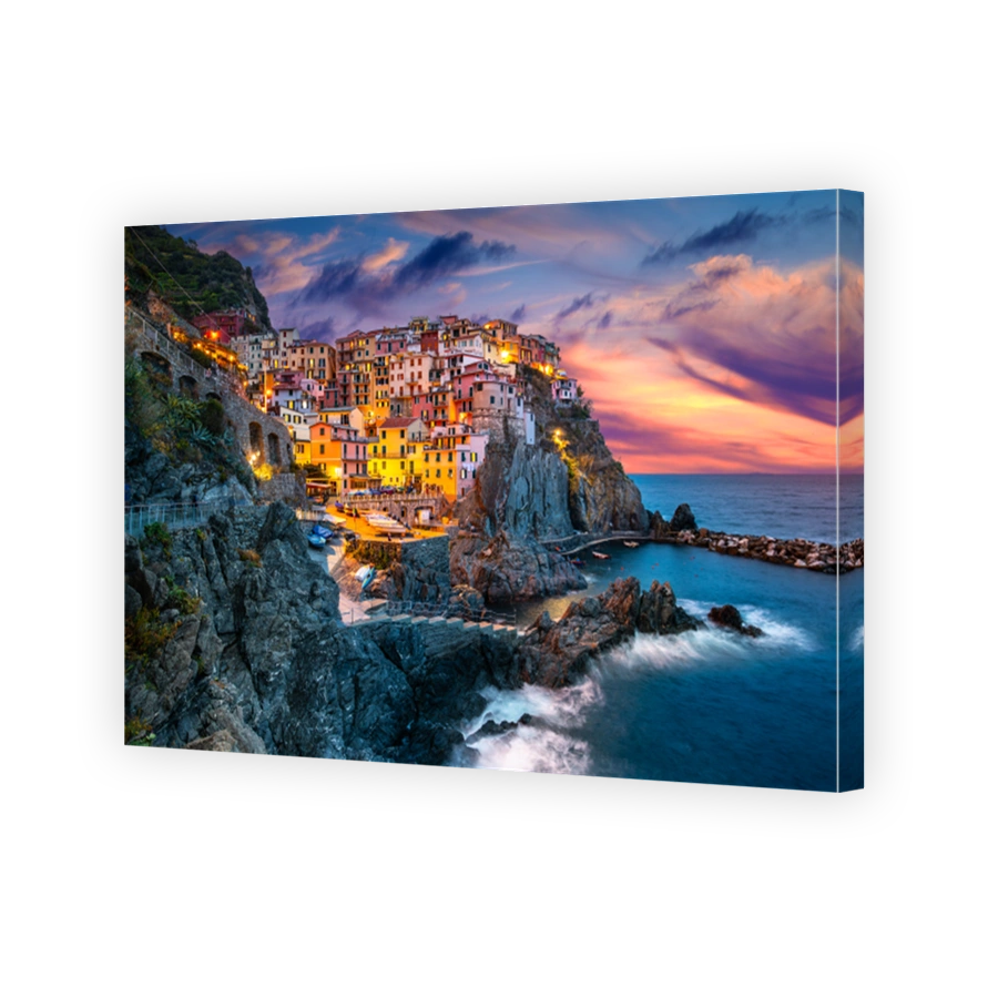 Manarola Village, Cinque Terre Coast of Italy. Manarola a beautiful small town in the province of La Spezia, Liguria, north of Italy and one of the five Cinque terre travel attractions, Sunset colors