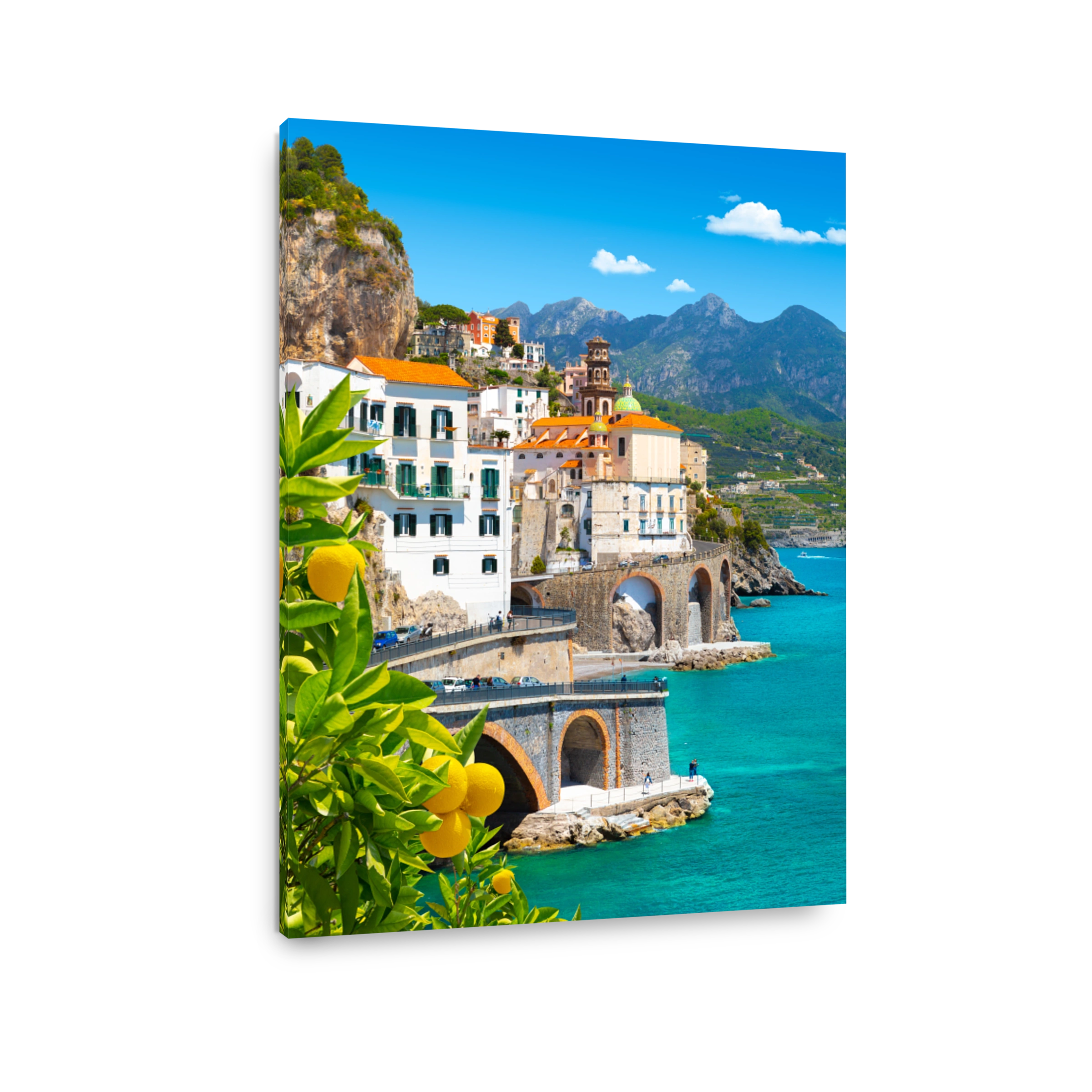 Beautiful view of Amalfi on the Mediterranean coast with lemons in the foreground, Italy