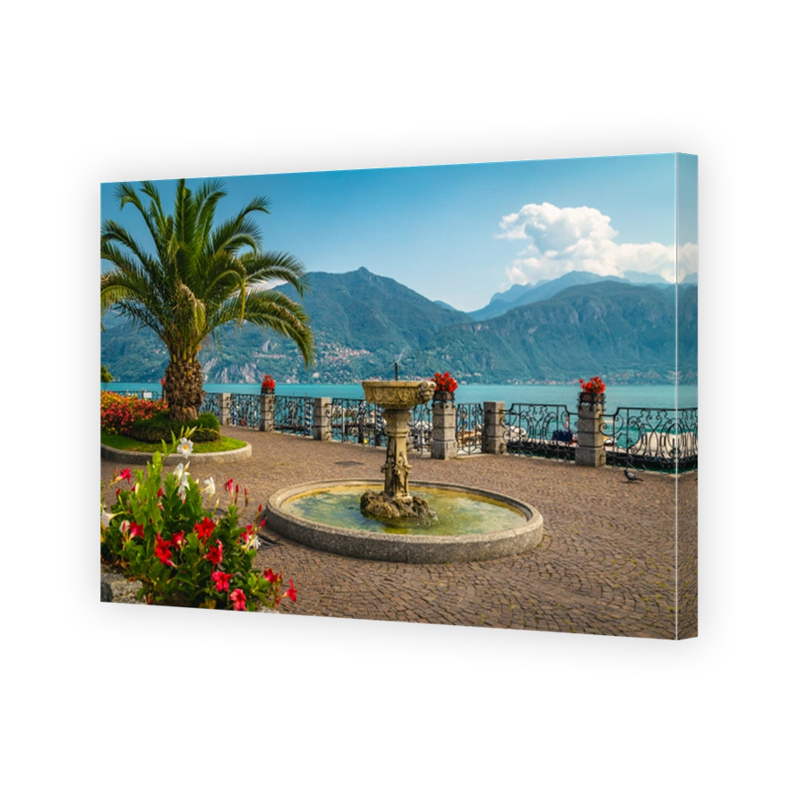 Water fountain and flowery decoration on the walkway, Menaggio, Italy