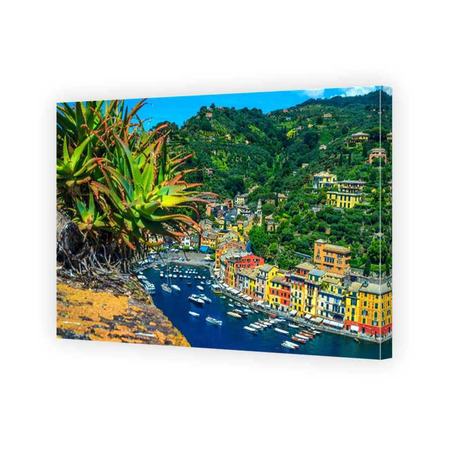 Mediterranean Portofino village and luxury yachts in harbor, Liguria, Italy