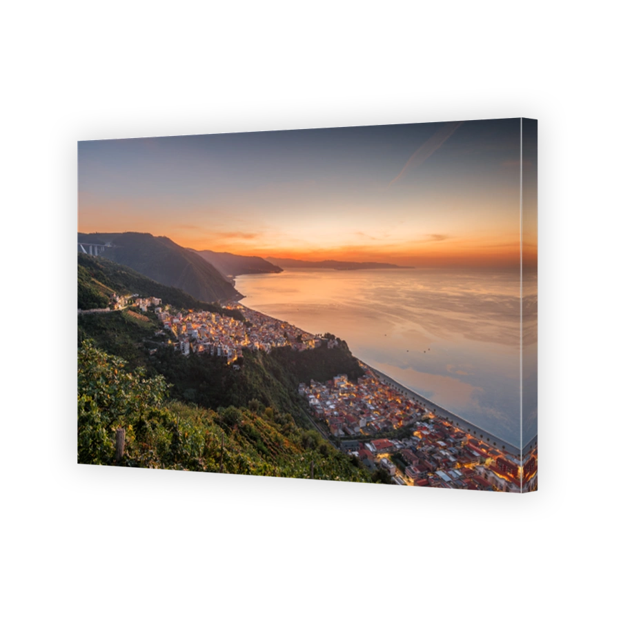 Bagnara Calabra, Italy cityscape overlooking the Tyrrhenian Sea at sunset.