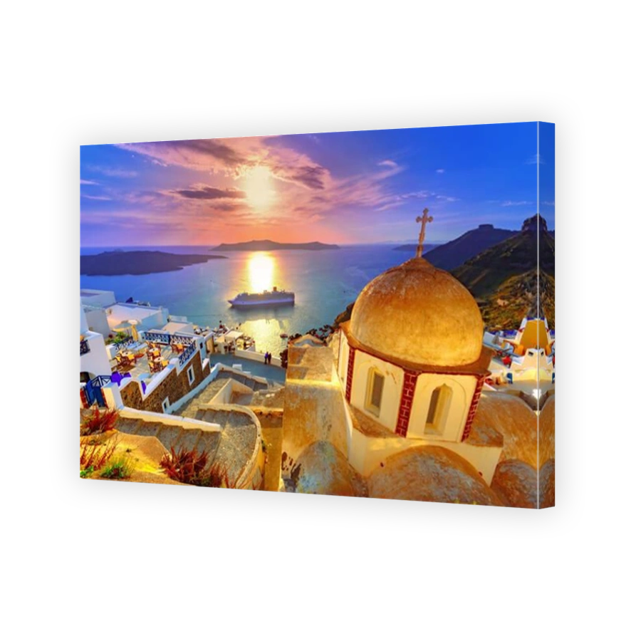Oia town on Santorini island, Greece. Traditional and famous houses and churches with blue domes over the Caldera, Aegean sea