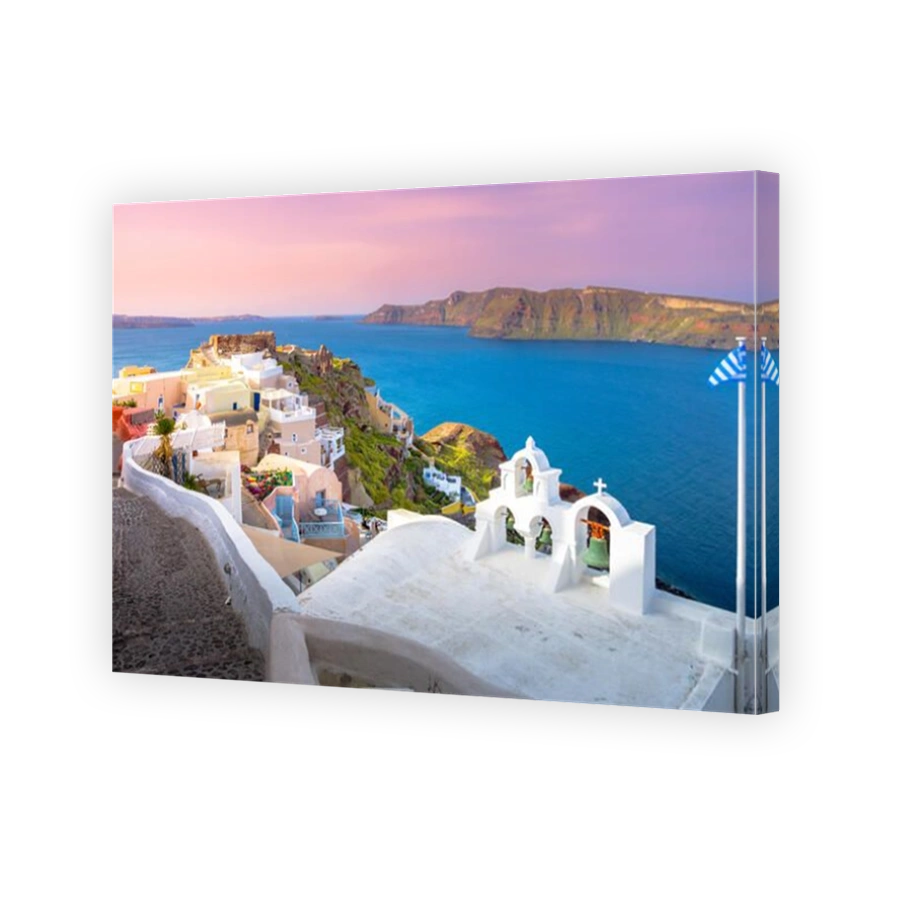 Oia town on Santorini island, Greece. Traditional and famous houses and churches with blue domes over the Caldera, Aegean sea
