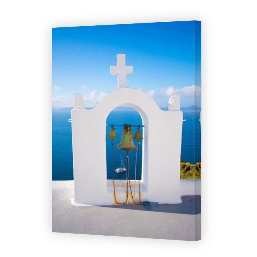 Bell tower of an orthodox church at Santorini, Greece. Honeymoon summer aegean cycladic background.