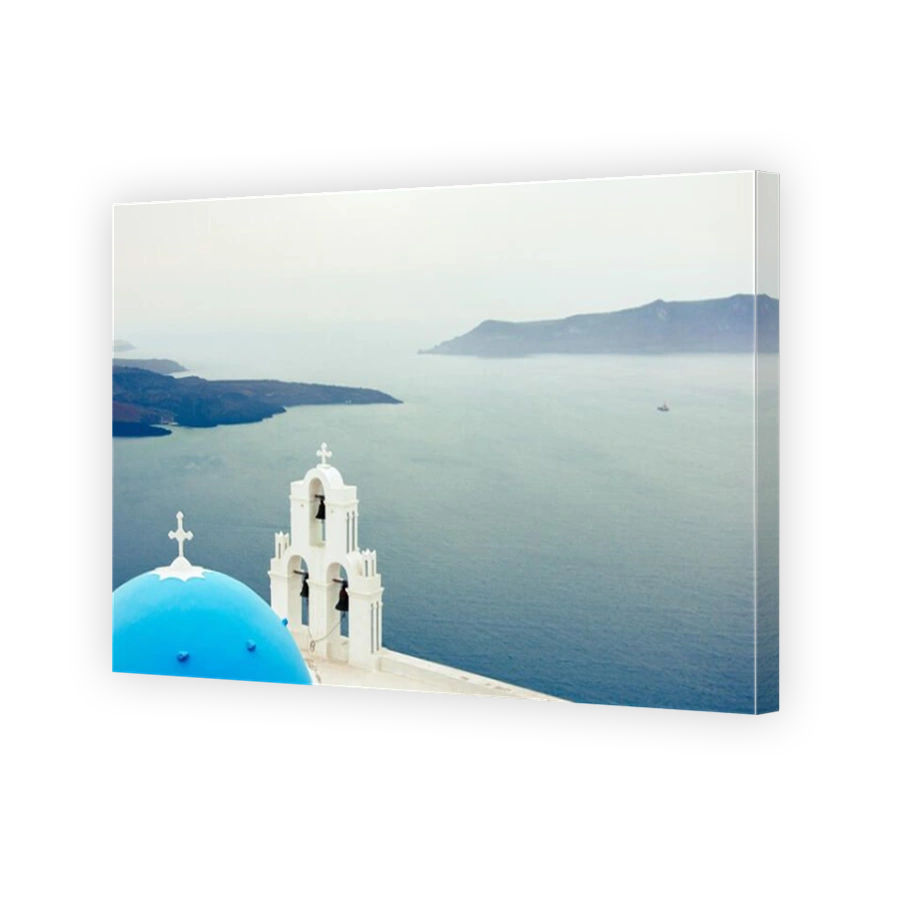 Bell tower of an orthodox church at Santorini, Greece. Honeymoon summer aegean cycladic background.
