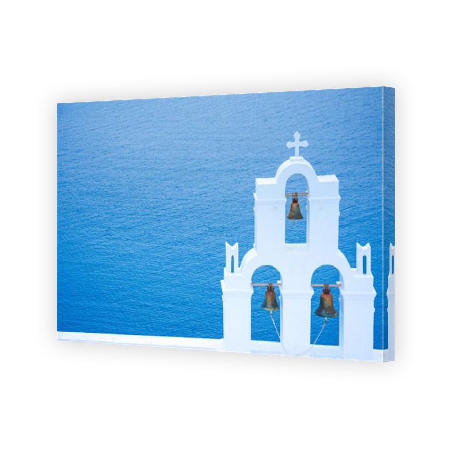 Bell tower of an orthodox church at Santorini, Greece. Honeymoon summer aegean cycladic background.