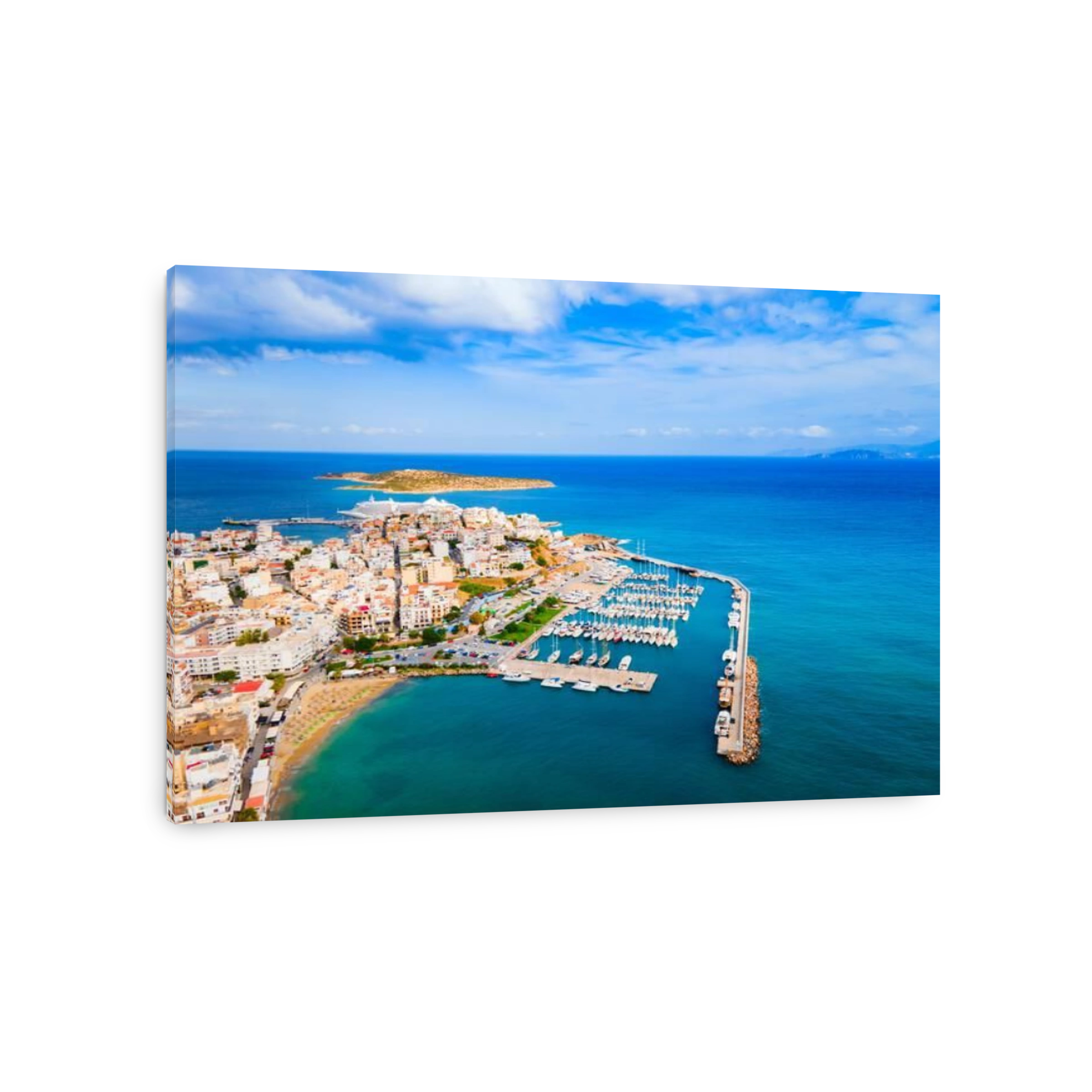 Agios Nikolaos port aerial panoramic view. Agios, Hagios or Aghios Nikolaos is a coastal city on the island of Crete in Greece.