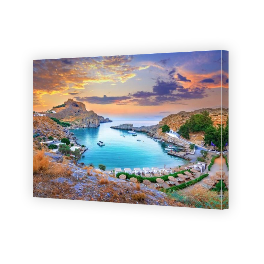 Panoramic view of St. Paul bay with acropolis of Lindos in background, Rhodes island, Greece