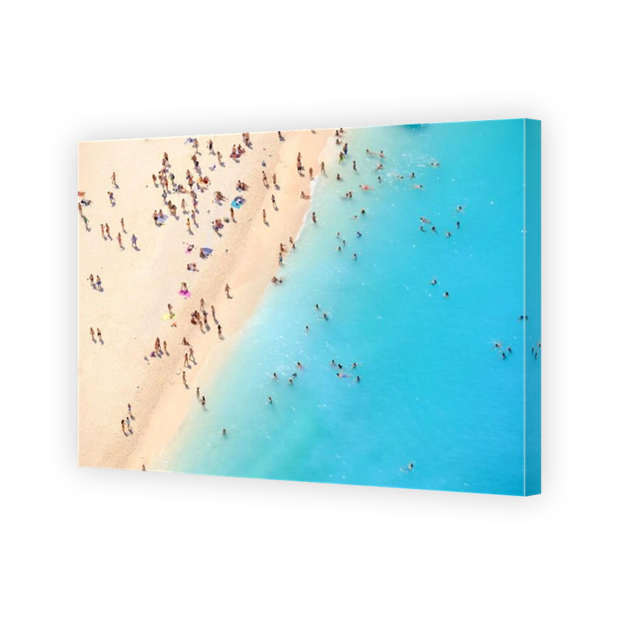 Tourists on the sand beach of Navagio Zakynthos Greece.