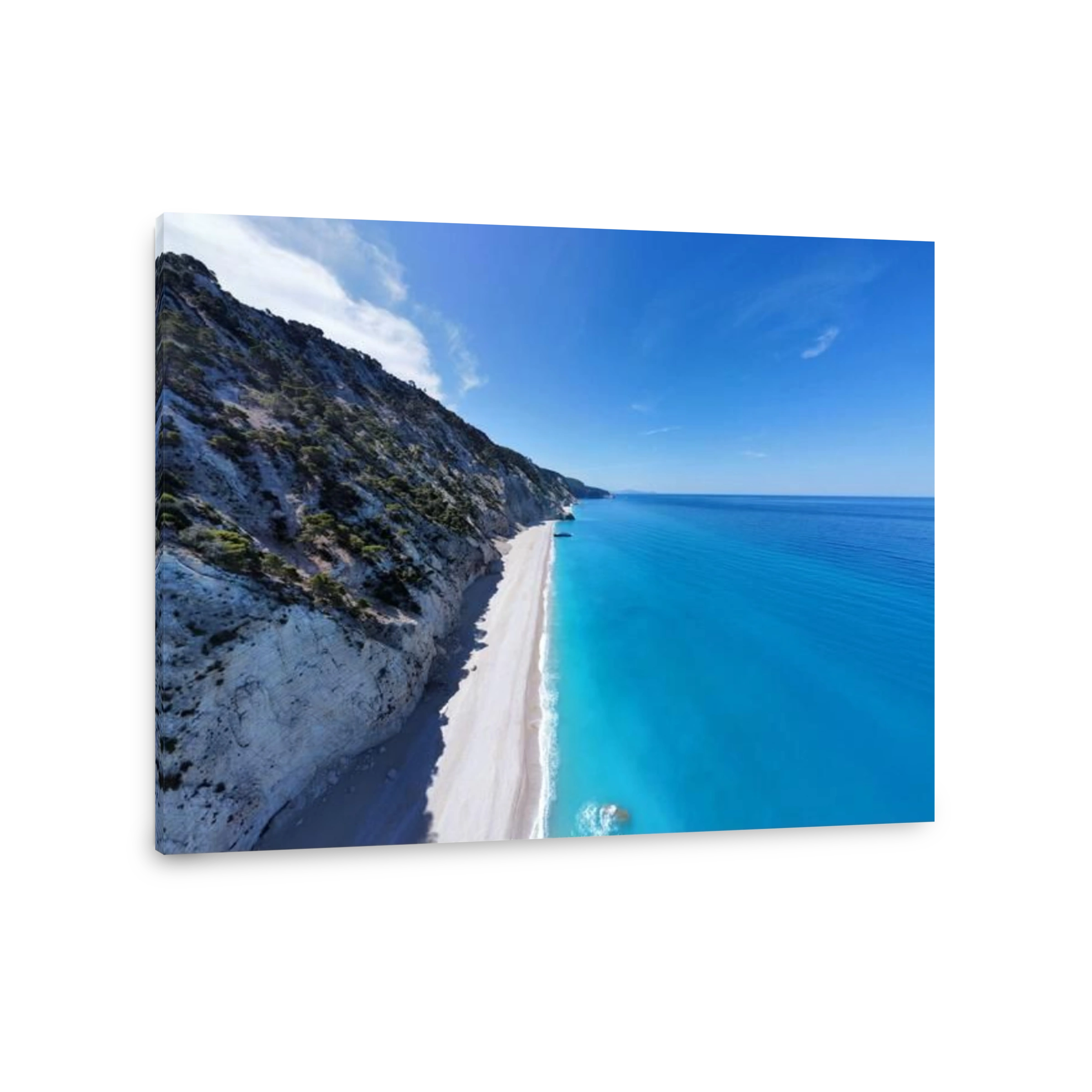 Aerial view of a pristine beach with turquoise water and a rugged cliffside under a clear blue sky in Lefkada, Greece